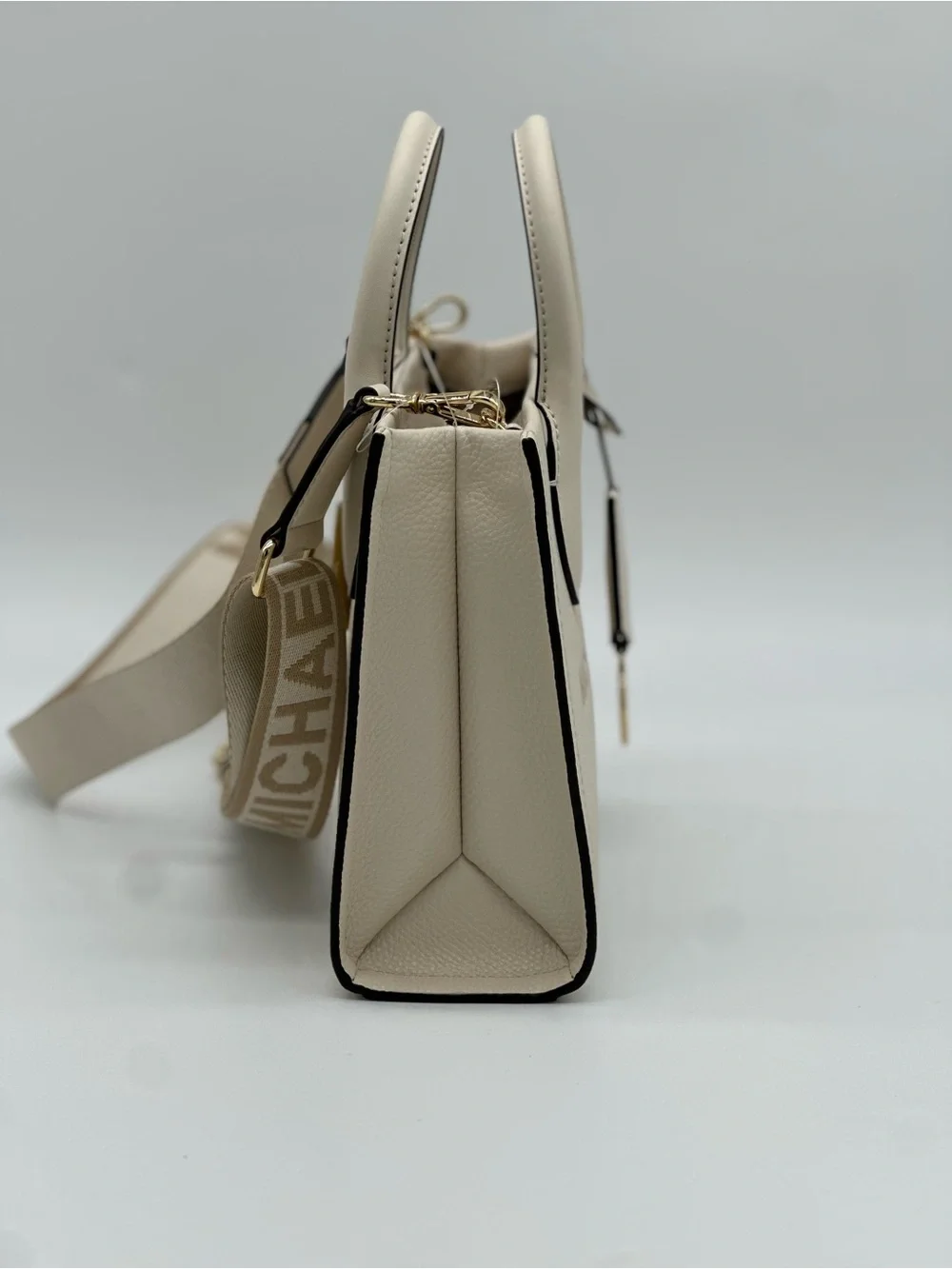 Michael Kors Cream Pebbled Leather Satchel with Logo Strap